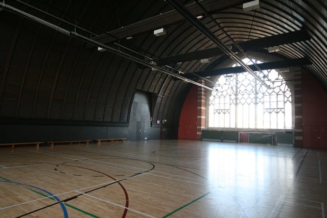 Spacious Sports Hall at The Harrow Club, ideal for events and gatherings.